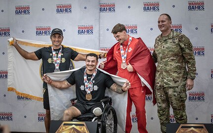 U.S. Army Col. Christopher Leung, left, U.S Army Retired Sgt. Jason Smith, center, U.S. Marine Corps Lance Cpl. Dakota Shaffer, and U.S. Army Sgt. Maj. Christopher Carey, the Deputy Chief of Staff Sergeant Major.