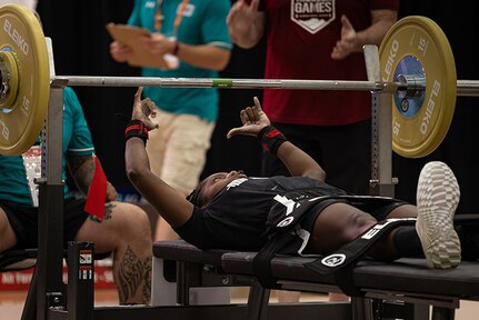 U.S. Army 1st Lt. Jani Merritt celebrates after completing her rep at the powerlifting competition during the 2025 Department of Defense Warrior Games at Colorado Springs, Colorado, July 18, 2025.