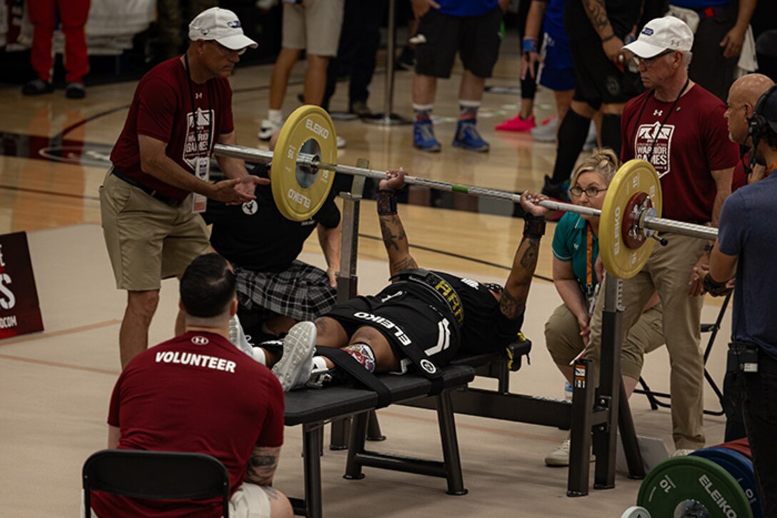 U.S. Army Retired Sgt. 1st Class Valerie Watkins completes her lift at the powerlifting competition during the 2025 Department of Defense Warrior Games at Colorado Springs, Colorado, July 18, 2025.