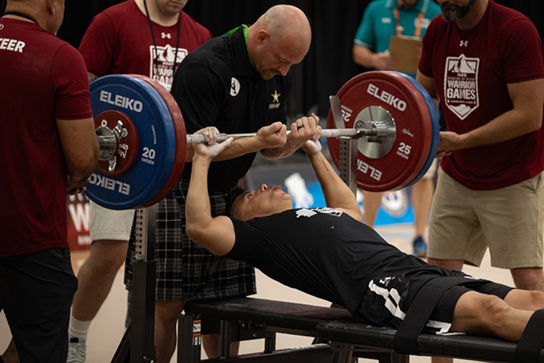 U.S. Army Sgt. 1st Class Alberto Alvarez prepares execute his lift during the powerlifting competition at the 2025 Department of Defense Warrior Games at Colorado Springs, Colorado, July 18, 2025.