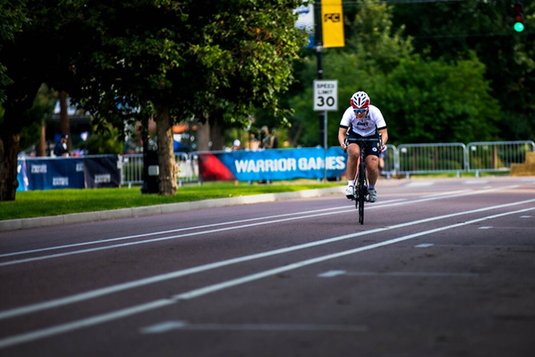U.S. Army Sgt. Bianca Hayden, completes her first lap during the upright bicycle event at the 2025 Department of Defense Warrior Games, Colorado Springs, Colorado, July 19, 2025.
