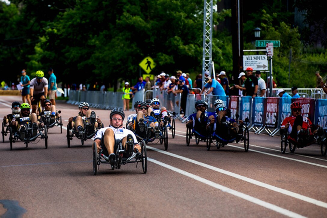 Department of Defense Warrior Games athletes, charge forward and begin the recumbent cycle event in the 2025 Department of Defense Warrior Games, Colorado Springs, Colorado, July 19, 2025.