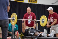 U.S. Army Retired Sgt. 1st Class Valerie Watkins begins her rep in the powerlifting event during the 2025 Department of Defense Warrior Games at Reid Arena, Colorado Springs, Colorado, July 18, 2025.