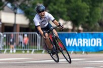U.S. Army Capt. Kyra Maggio pushes to the finish line at the cycling event during the 2025 Department of Defense Warrior Games at Colorado Springs, Colorado, July 19, 2025.