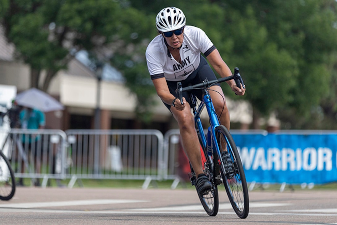 U.S. Army Lt. Col. Sherri Sanders competes in the cycling event during the 2025 Department of Defense Warrior Games at Colorado Springs, Colorado, July 18, 2025.
