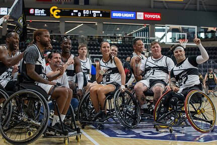 Team Army athletes pose for a group photo after a game of wheelchair basketball at the 2025 Department of Defense Warrior Games in Colorado Springs, Colorado July 19, 2025.