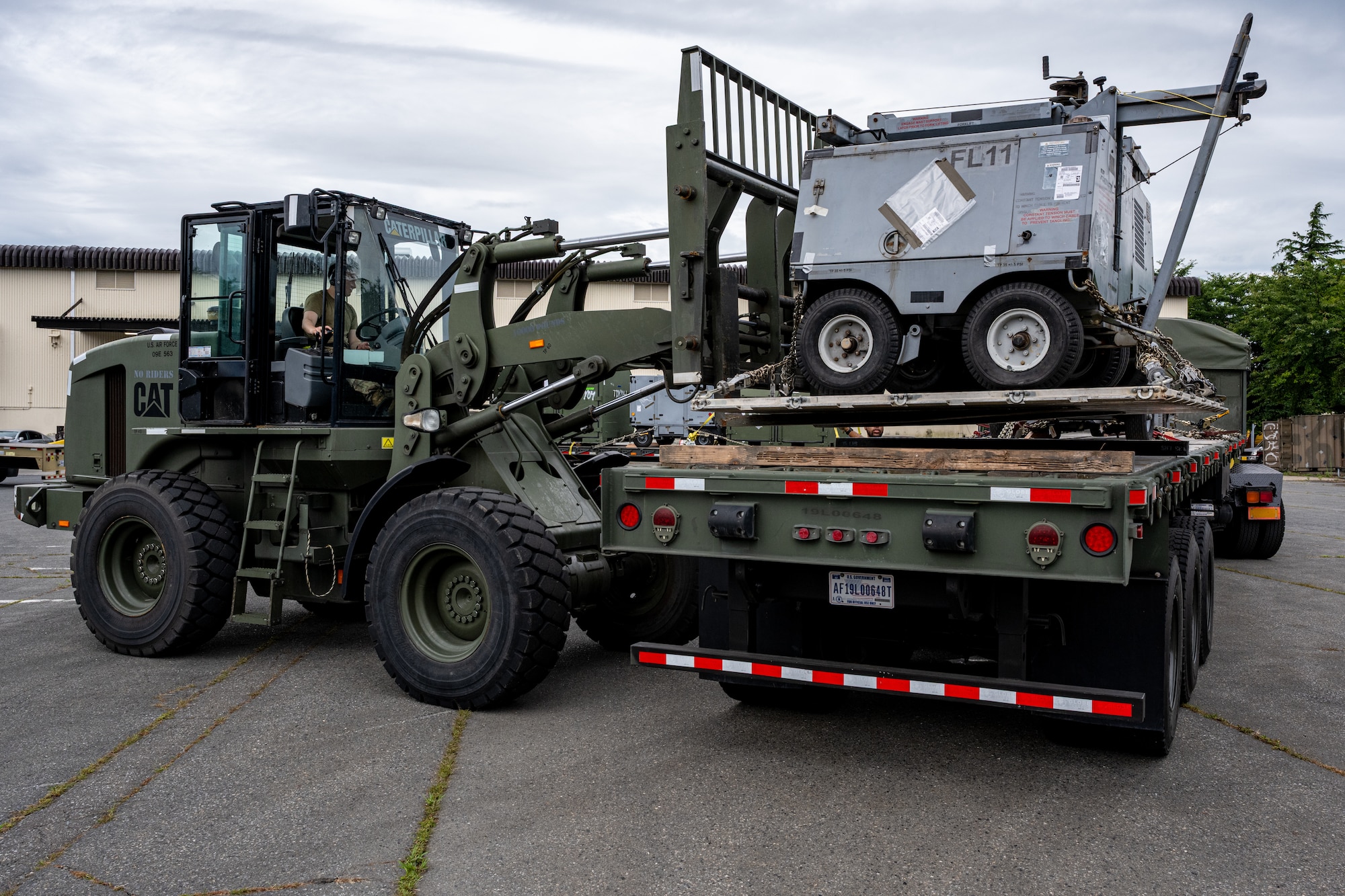 A U.S. Air Force Airman assigned to the 35th Logistics Readiness Squadron loads cargo onto a truck during exercise Resolute Force Pacific (REFORPAC) 2025.