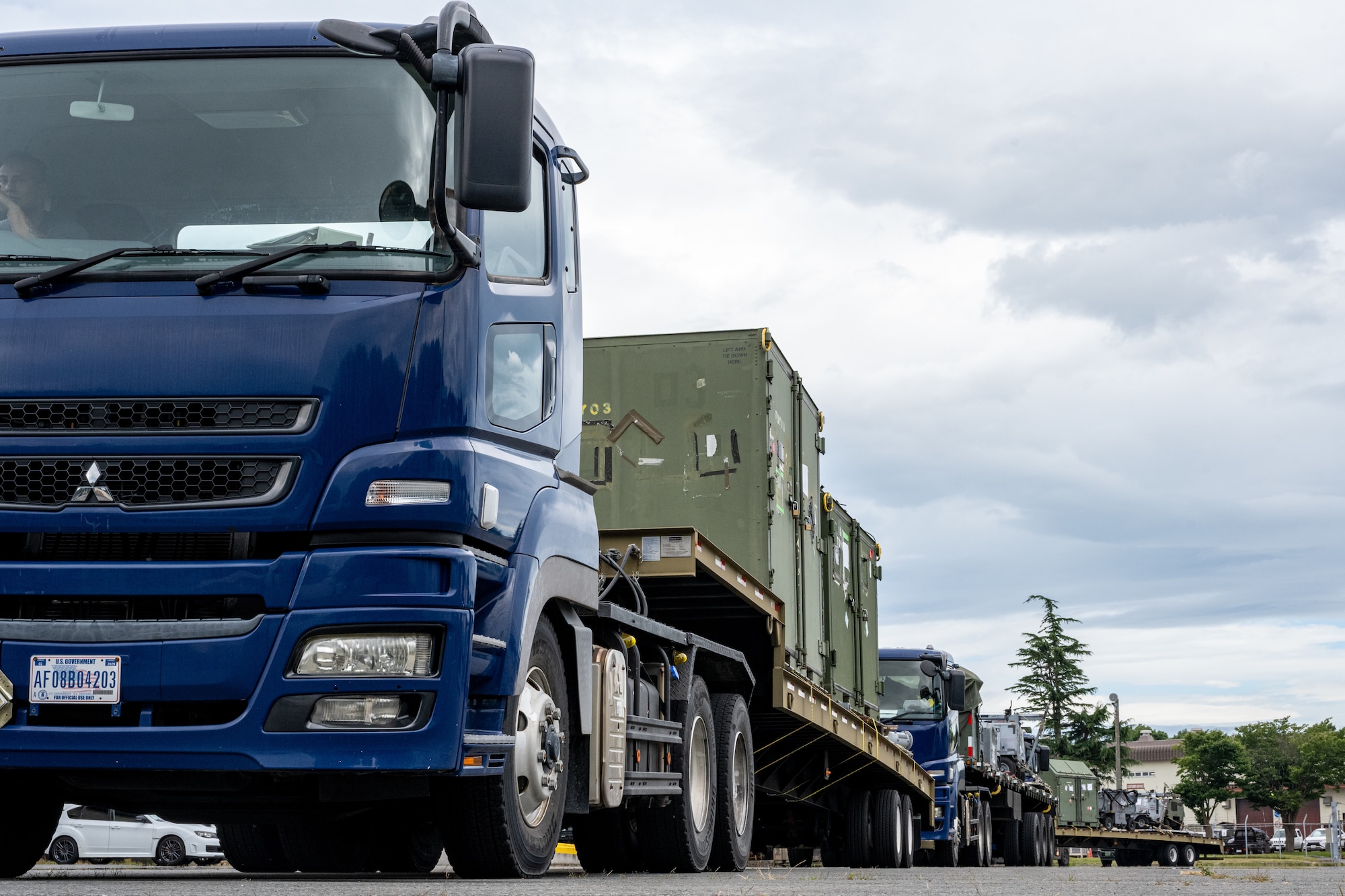 Cargo sits on trucks to prepare for Agile Combat Employment operations during exercise Resolute Force Pacific (REFORPAC) 2025.