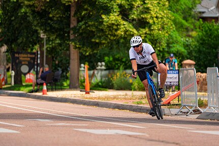 U.S. Army Chief Warrant Officer 4 Joann Tsuhako competes in the women's upright bicycle road race at the cycling event during the 2025 Department of Defense Warrior Games at Colorado Springs, Colorado, July 19, 2025.