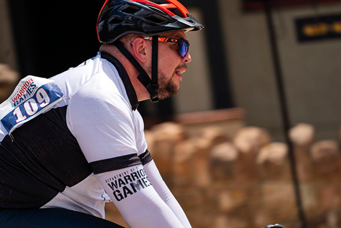 U.S. Army Sgt. 1st Class Adam Proctor competes in the men's upright bicycle road race at the cycling event during the 2025 Department of Defense Warrior Games at Colorado Springs, Colorado, July 19, 2025.