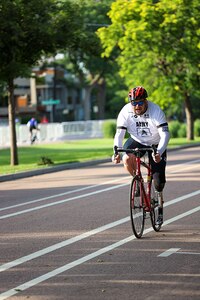 U.S. Army Sgt. 1st Class Adam Proctor competes in the time trials at the cycling event during the 2025 Department of Defense Warrior Games at Colorado Springs, Colorado, July 19, 2025.