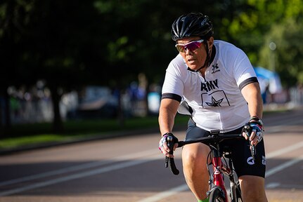 U.S. Army Chief Warrant Officer 4 Joann Tsuhako participates in the women's upright bicycle time trials at the cycling event during the 2025 Department of Defense Warrior Games at Colorado College, Colorado Springs Colorado, July 19, 2025.