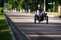 Retired U.S. Army Staff Sgt. John Michael Britton competes on a recumbent cycle in the time trials at the cycling event during the 2025 Department of Defense Warrior Games at Colorado College, Colorado Springs Colorado, July 19, 2025.