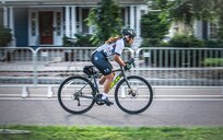 U.S. Army Staff Sgt. Mercedes Rangel, maintains her momentum on an upright cycle, during the Time Trial competition in the 2025 Department of Defense Warrior Games, Colorado Springs, Colorado, July 19, 2025.