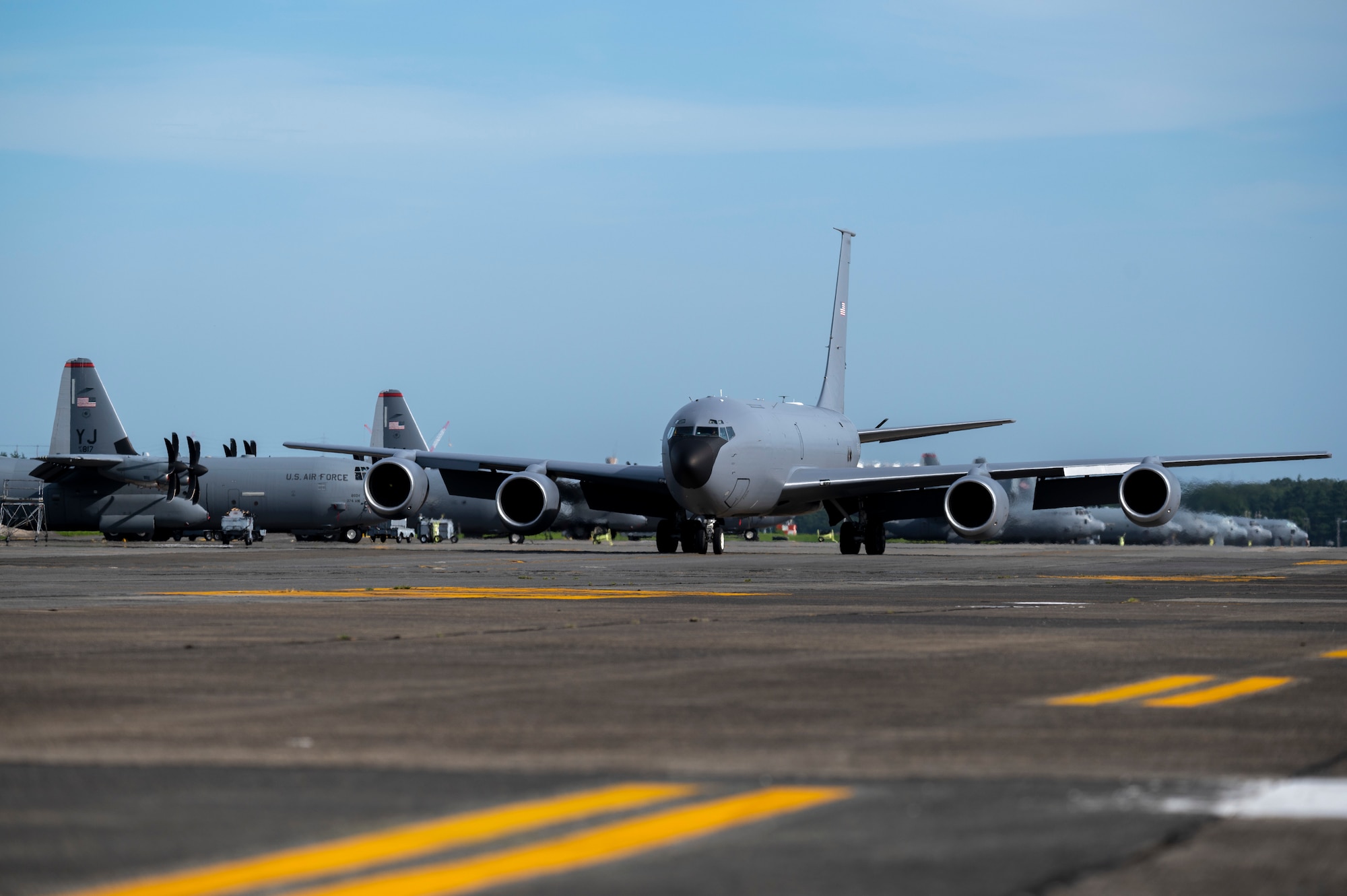 A KC-135 Stratotanker aircraft taxis down the flightline.
