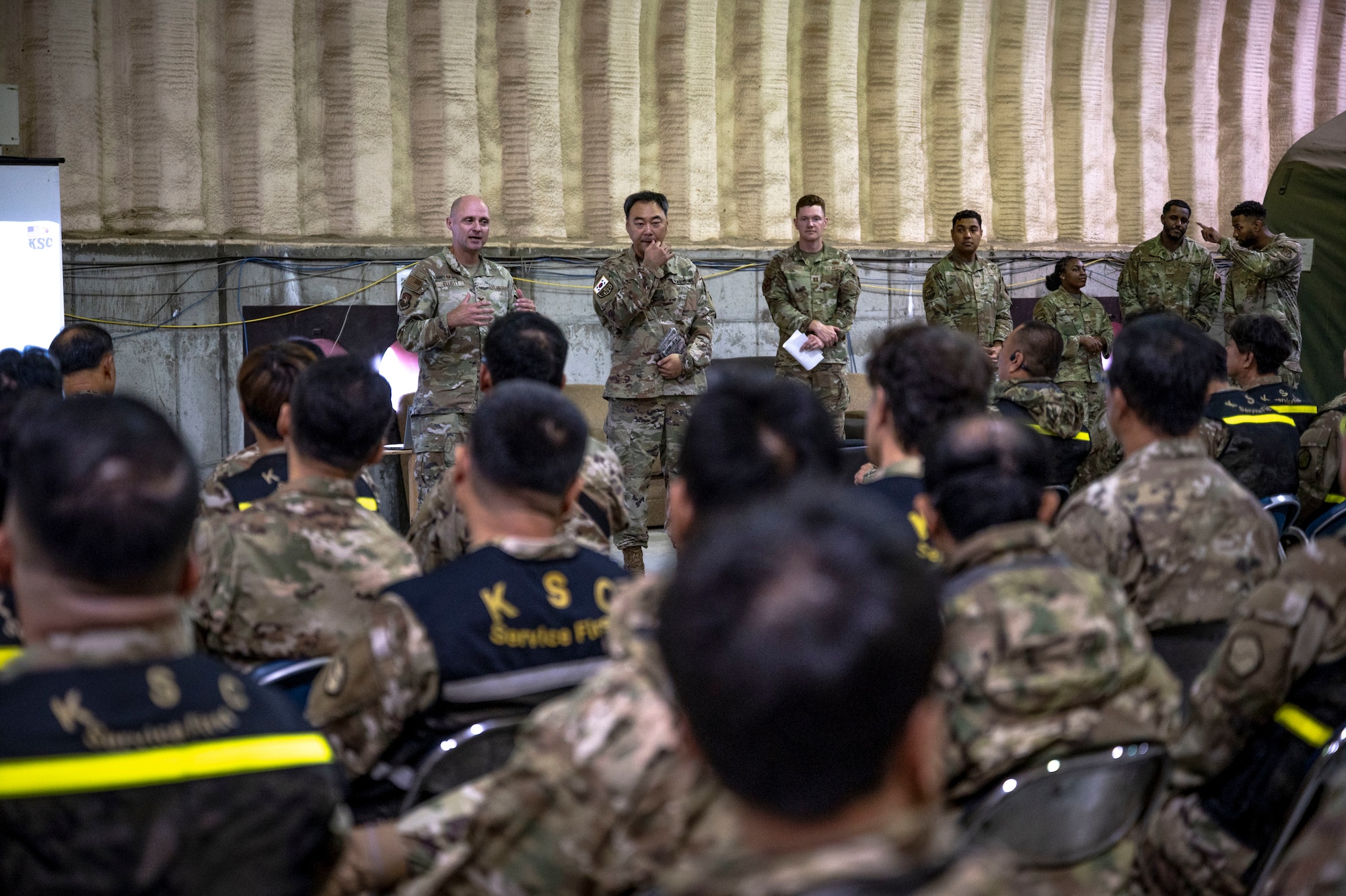U.S. Air Force Col. Jeff Elliott, 51st Mission Support Group Commander, briefed members of the Korean Service Corps Battalion during a bilateral logistics and transportation training event at Osan Air Base, Republic of Korea, July 17, 2025.