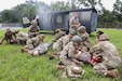 U.S. Soldiers with the 108th Medical Company Area Support, 213th Regional Support Group, Pennsylvania Army National Guard, pull simulated casualties from a simulated helicopter crash at Fort Indiantown Gap, Pennsylvania, July 18, 2025.