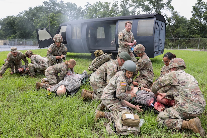 U.S. Soldiers with the 108th Medical Company Area Support, 213th Regional Support Group, Pennsylvania Army National Guard, pull simulated casualties from a simulated helicopter crash at Fort Indiantown Gap, Pennsylvania, July 18, 2025.
