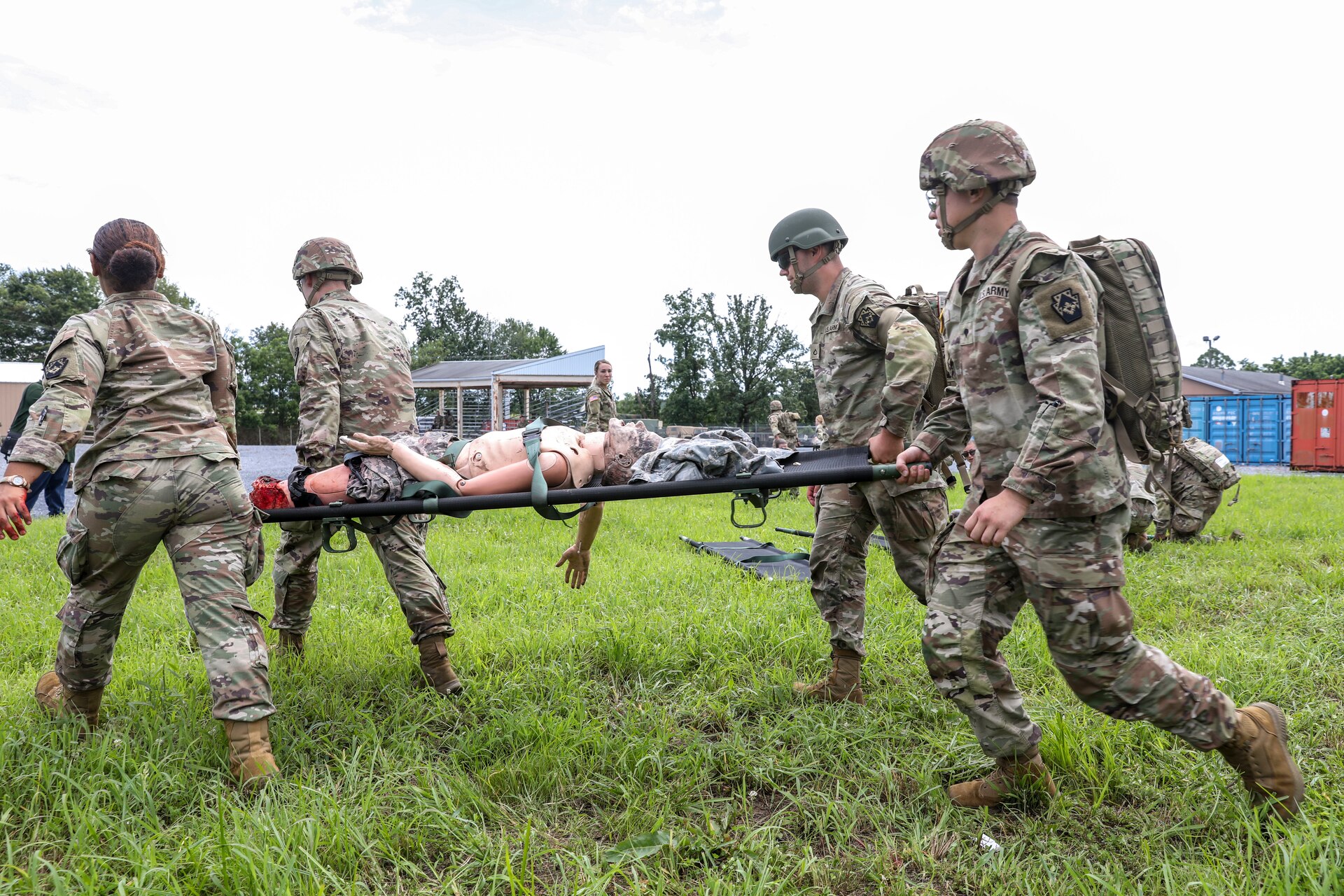 U.S. Soldiers with the 108th Medical Company Area Support, 213th Regional Support Group, Pennsylvania Army National Guard, pull simulated casualties from a simulated helicopter crash at Fort Indiantown Gap, Pennsylvania, July 18, 2025.