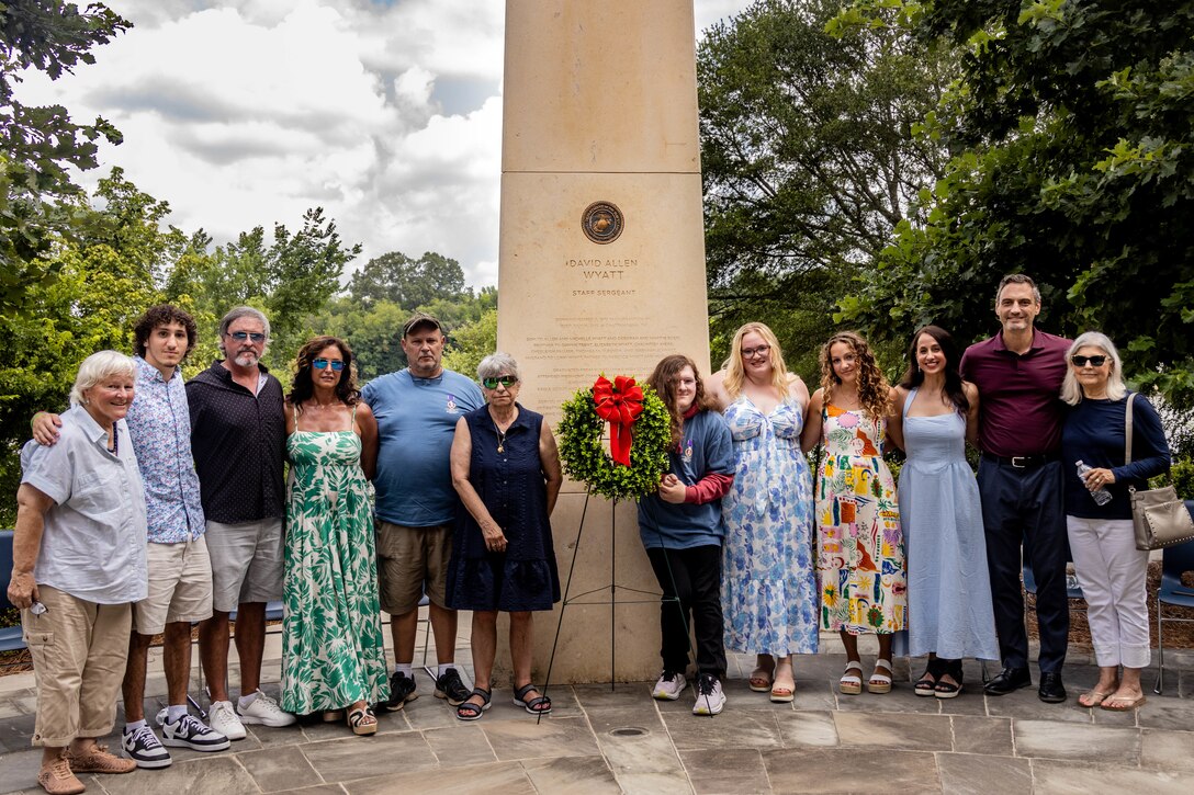 The family of U.S. Marine Corps Staff Sgt. David Wyatt, Battery M, 3rd Battalion, 14th Marine Regiment, 4th Marine Division, Fallen Five, pose for a photo after the fallen five memorial ceremony at the Wreath of Honor Fallen Five Memorial Park, Chattanooga, Tennessee, July 16th, 2025. The Wreath of Honor Fallen Five Memorial honors the loss of five U.S. service members tragically killed July 16th, 2015, in a terrorist attack in Chattanooga, today, marking the 10-year anniversary and the vivid memory of their sacrifice. (U.S. Marine Corps photo by Lance Cpl. Edward Spears)