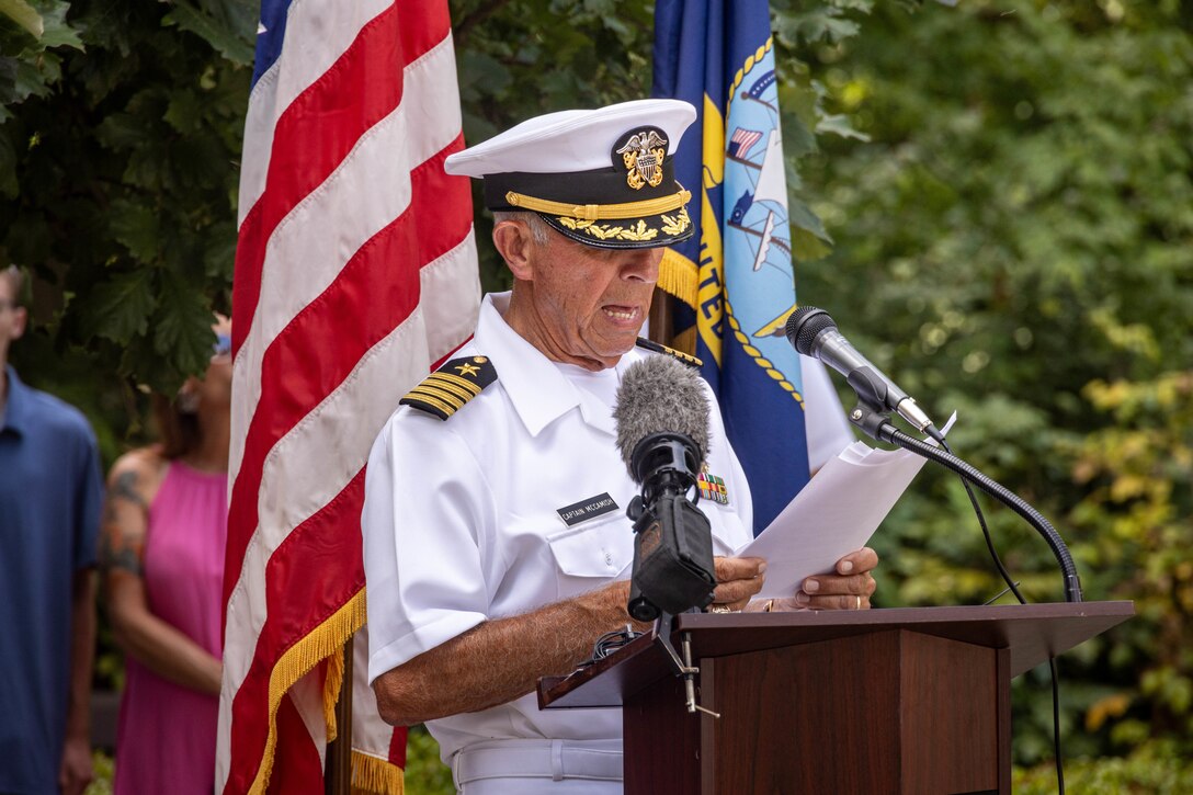 U.S. Navy Captain Mickey McCamish, retired, gives final tributes to the fallen five during the fallen five memorial ceremony at the Wreath of Honor Fallen Five Memorial Park, Chattanooga, Tennessee, July 16th, 2025. The Wreath of Honor Fallen Five Memorial honors the loss of five U.S. service members tragically killed July 16th, 2015, in a terrorist attack in Chattanooga, today, marking the 10-year anniversary and the vivid memory of their sacrifice. (U.S. Marine Corps photo by Lance Cpl. Edward Spears)