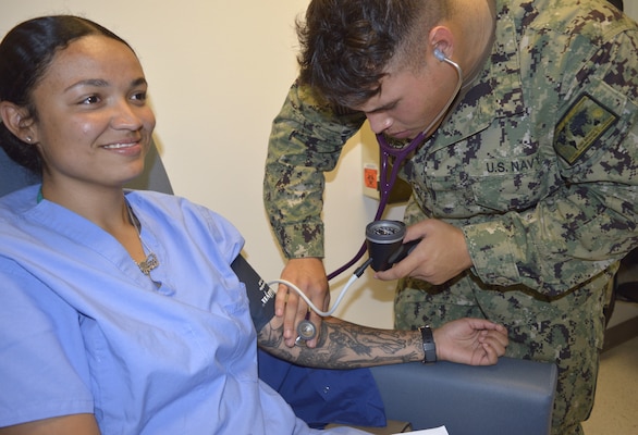 Manual heart rate, blood pressure, respiratory rate and more…Whether handling to a faux patient reporting body aches, sore throat and chills or being informed on the sugar tong method to stabilize a fracture, Naval Hospital Bremerton staff members honed their medical response abilities during the recently held July Skills Fair. Navy Nurse Corps officers and hospital corpsmen had the opportunity to improve upon their suturing techniques, primary assessment procedures, IV start experience and SAM medical splints application (Official Navy photo by Douglas H Stutz, NHB/NMRTC Bremerton public affairs officer)