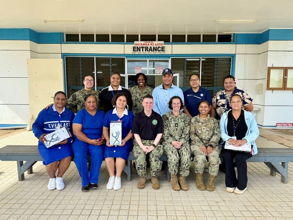 NUKU’ALOFA, Tonga (June 24, 2025) U.S. service members deployed in support of Pacific Partnership 2025 (PP-25), and local healthcare workers at Mu’a Health Centre pose for a group photo during PP-25 in Nuku’Alofa, Tonga, June 24, 2025. Now in its 21st iteration, the Pacific Partnership series is the largest annual multinational humanitarian assistance and disaster management preparedness mission conducted in the Indo-Pacific. Pacific Partnership works collaboratively with host and partner nations to enhance regional interoperability and disaster response capabilities, increase security and stability in the region, and foster new and enduring friendships in the Indo-Pacific. (U.S. Navy photo by Courtesy Asset/Released)