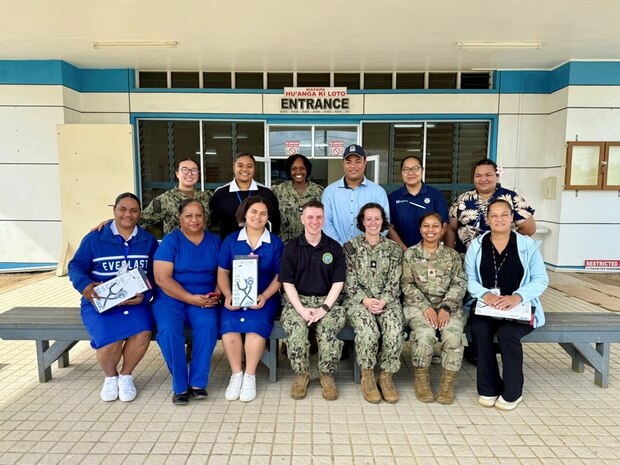 NUKU’ALOFA, Tonga (June 24, 2025) U.S. service members deployed in support of Pacific Partnership 2025 (PP-25), and local healthcare workers at Mu’a Health Centre pose for a group photo during PP-25 in Nuku’Alofa, Tonga, June 24, 2025. Now in its 21st iteration, the Pacific Partnership series is the largest annual multinational humanitarian assistance and disaster management preparedness mission conducted in the Indo-Pacific. Pacific Partnership works collaboratively with host and partner nations to enhance regional interoperability and disaster response capabilities, increase security and stability in the region, and foster new and enduring friendships in the Indo-Pacific. (U.S. Navy photo by Courtesy Asset/Released)