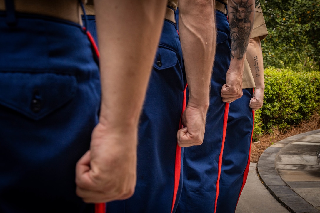 U.S. Marines with Battery M, 3rd battalion, 14th Marines, 4th Marine Division, Marine Forces Reserve, awaits memorial wreath procedures during the fallen five memorial ceremony at the Wreath of Honor Fallen Five Memorial Park, Chattanooga, Tennessee, July 16th, 2025. The Wreath of Honor Fallen Five Memorial honors the loss of five U.S. service members tragically killed July 16th, 2015, in a terrorist attack in Chattanooga, today, marking the 10-year anniversary and the vivid memory of their sacrifice. (U.S. Marine Corps photo by Lance Cpl. Edward Spears)