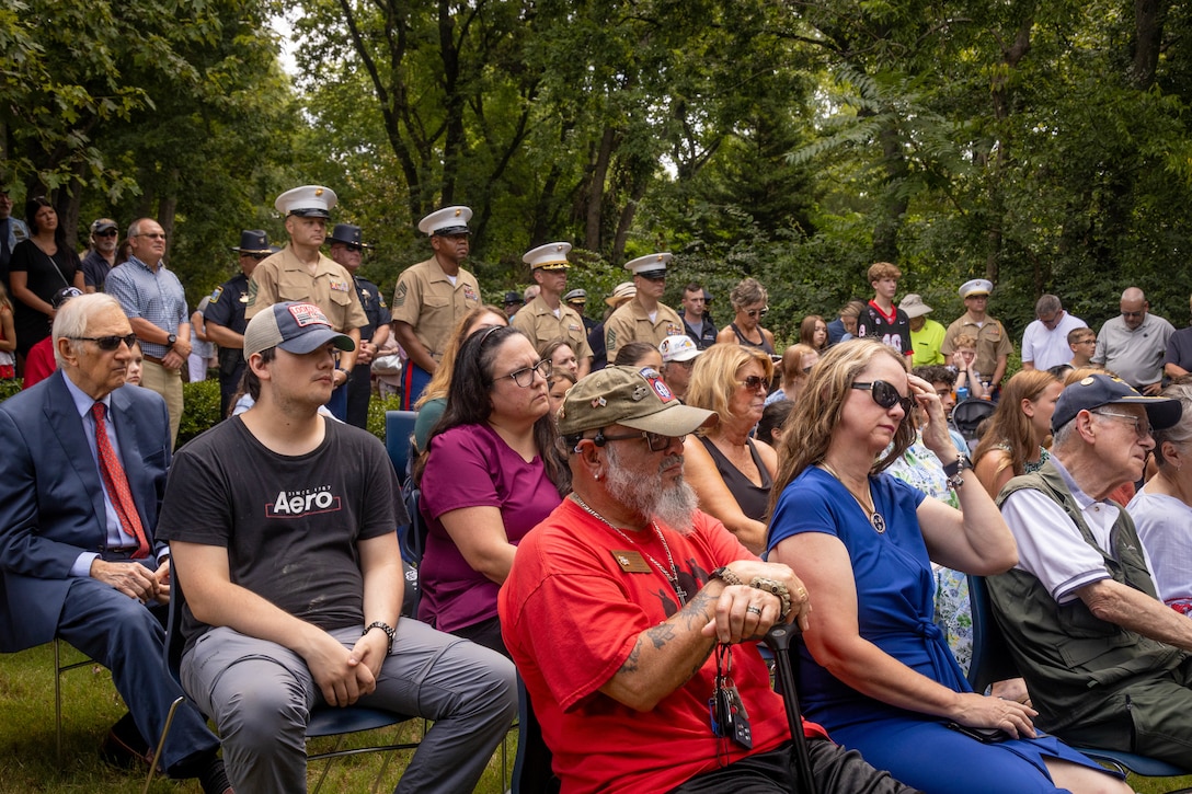 U.S. service members and civilians of Chattanooga listen to speeches during the fallen five memorial ceremony at the Wreath of Honor Fallen Five Memorial Park, Chattanooga, Tennessee, July 16th, 2025. The Wreath of Honor Fallen Five Memorial honors the loss of five U.S. service members tragically killed July 16th, 2015, in a terrorist attack in Chattanooga, today, marking the 10-year anniversary and the vivid memory of their sacrifice. (U.S. Marine Corps photo by Lance Cpl. Edward Spears)