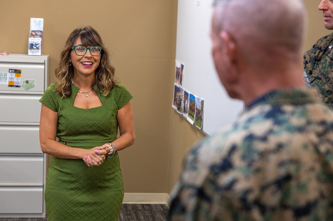 The 39th Commandant of the Marine Corps, Gen. Eric Smith recognizes Mrs. Debbie Wanko, G-8 deputy assistant chief of staff, Marine Forces Reserve, for her selection as the Marine Forces Reserve senior civilian of the year at Marine Corps Support Facility, New Orleans, July 17, 2025. Smith visited New Orleans to oversee and recognize the Marines and staff who dedicate their time and efforts to support the MARFORRES and MARFORSOUTH missions. (U.S. Marine Corps photo by Cpl. Aaron TorresLemus)