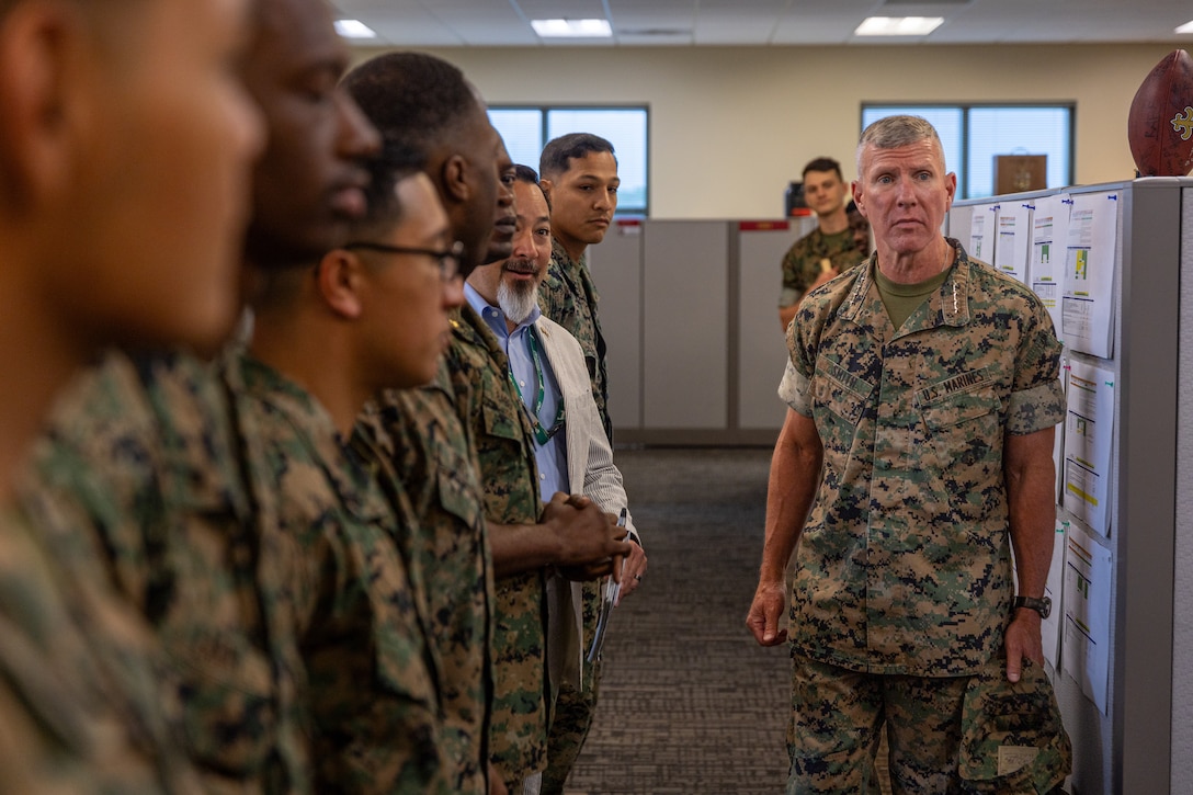 U.S. Marines with the Distribution Management Office, Marine Forces Reserve, line up as they welcome Gen. Eric Smith, 39th Commandant of the Marine Corps at Marine Corps Support Facility New Orleans, July 17, 2025. Smith visited New Orleans to recognize the Marines and staff who dedicate their time and efforts to support the MARFORRES and MARFORSOUTH missions. (U.S. Marine Corps photo by Cpl. Aaron TorresLemus)