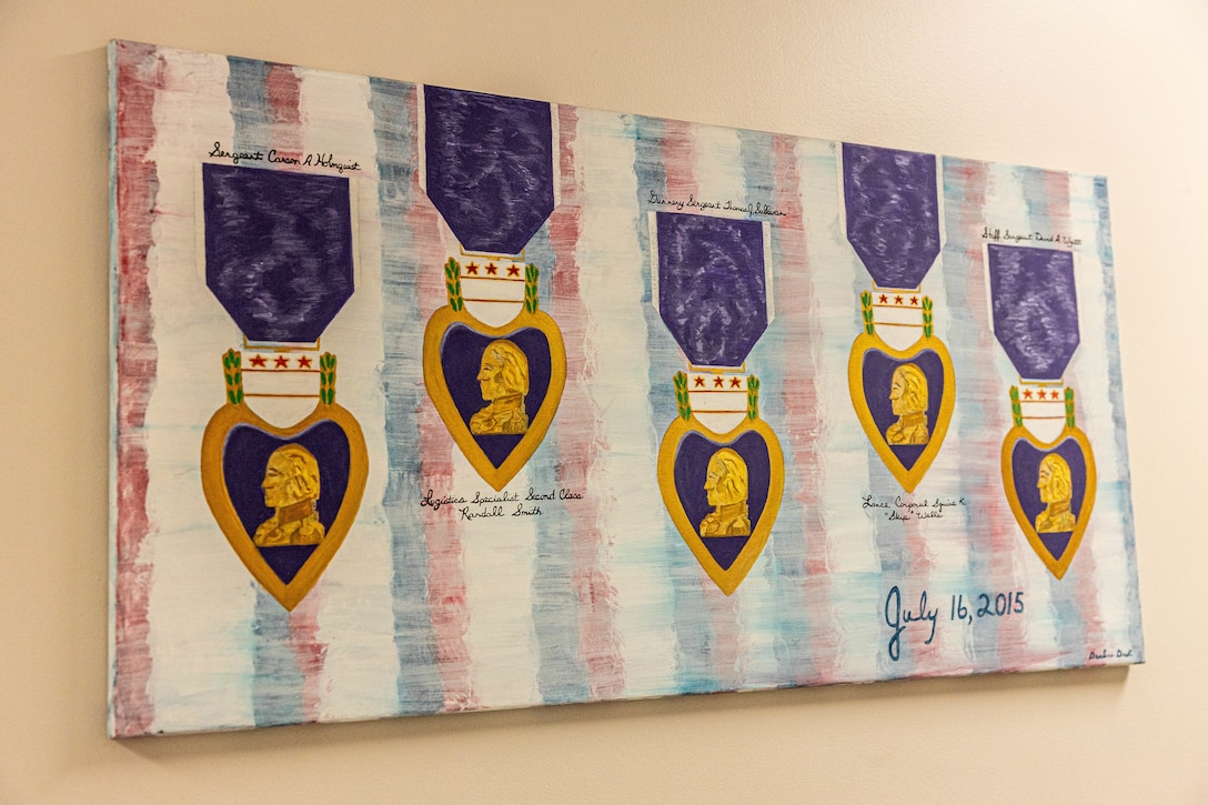 Navy Reserve Center Chattanooga, displays a portrait of purple heart recipients from the fallen five Chattanooga, Tennessee, July 16th, 2025. The NRC was the command of the fallen five who lost their life’s July 16th, 2015, in a terrorist attack in Chattanooga, today, marking the 10-year anniversary and the vivid memory of their sacrifice. (U.S. Marine Corps photo by Lance Cpl. Edward Spears)