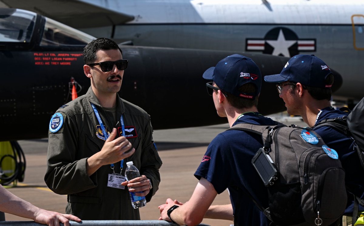 Pilot speaks with air show visitors about aircraft U-2S Dragon Lady.