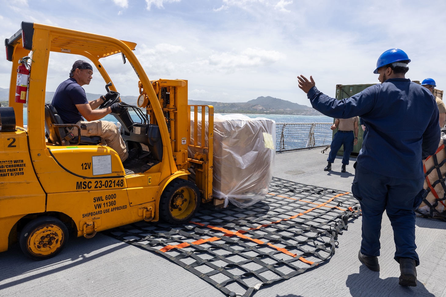 PUERTO PLATA, Dominican Republic (July 15, 2025) Sailors and Military Sealift Command personnel assigned to the Mercy-class hospital ship USNS Comfort (T-AH 20) load medical site cargo aboard Comfort in Puerto Plata, Dominican Republic during Continuing Promise 2025, July 15, 2025. Continuing Promise 2025 is the 16th iteration of the U.S. 4th Fleet/U.S. Naval Forces Southern Command-led Mission since 2007, which aims to foster goodwill, strengthen existing partnerships with partner nations, and form new partnerships between host nations, non-federal entities, and international organizations. (U.S. Navy photo by Mass Communication Specialist 2nd Class Alfredo Marron)