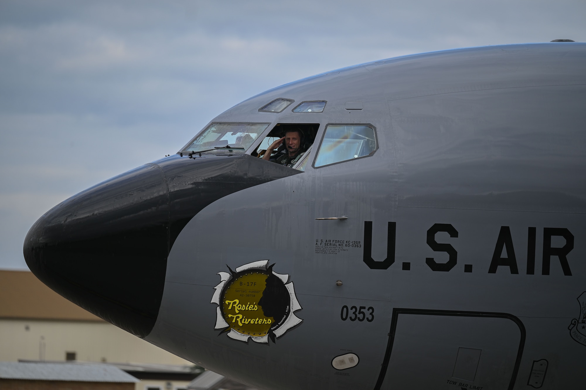 U.S. Air Force Col. Ryan Garlow, 100th Air Refueling Wing commander, renders a salute after landing a KC-135 Stratotanker at RAF Mildenhall, England, July 17, 2025.