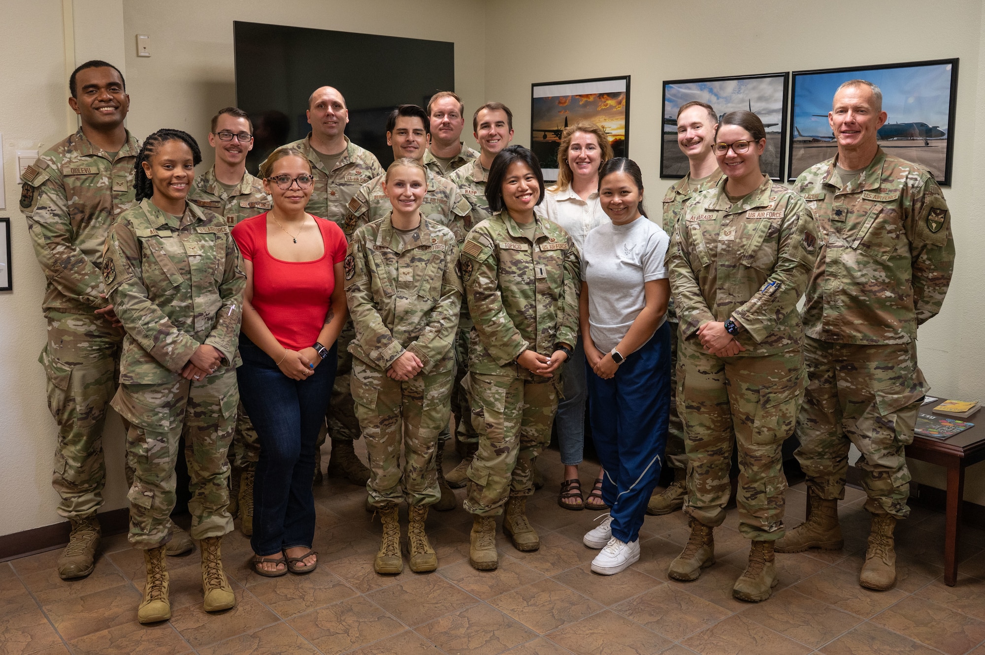 Members of the 355th Wing Office of the Staff Judge Advocate pose for a group photo at Davis-Monthan Air Force Base, Arizona, July 18, 2025. The OSJA provides legal assistance to eligible personnel and legal counsel to commanders on all matters affecting the installation and the mission. (U.S. Air Force photo by Airman Jaden Kidd)