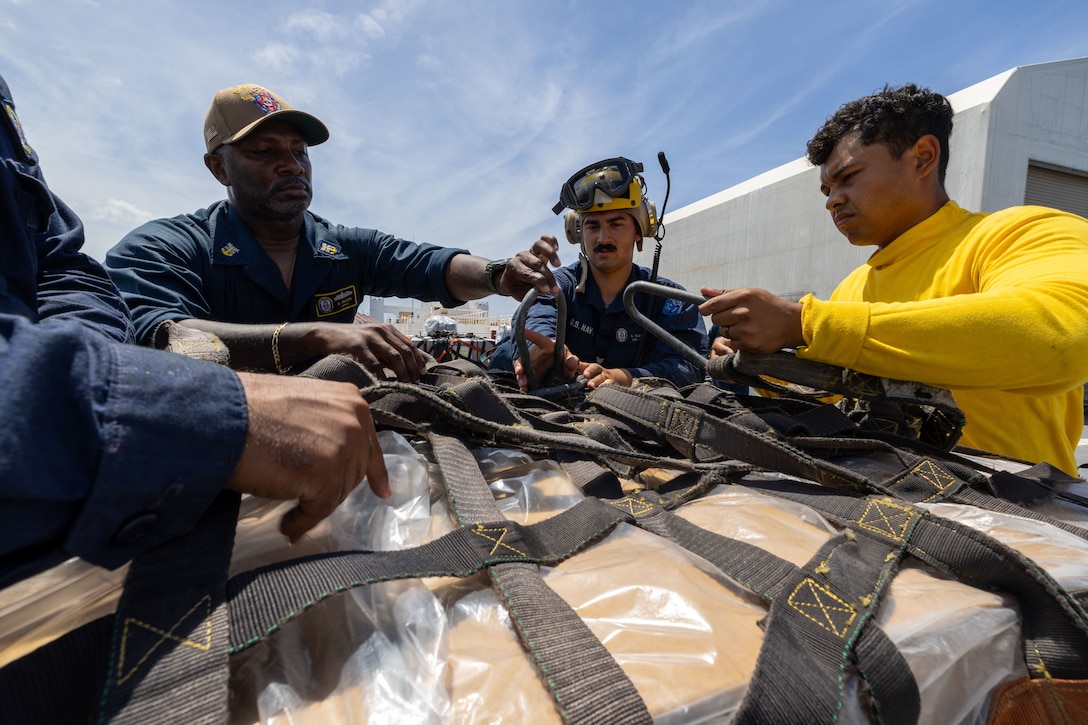 PUERTO PLATA, Dominican Republic (July 15, 2025) Sailors assigned to the Mercy-class hospital ship USNS Comfort (T-AH 20) load medical site cargo aboard Comfort in Puerto Plata, Dominican Republic during Continuing Promise 2025, July 15, 2025. Continuing Promise 2025 is the 16th iteration of the U.S. 4th Fleet/U.S. Naval Forces Southern Command-led Mission since 2007, which aims to foster goodwill, strengthen existing partnerships with partner nations, and form new partnerships between host nations, non-federal entities, and international organizations. (U.S. Navy photo by Mass Communication Specialist 2nd Class Alfredo Marron)