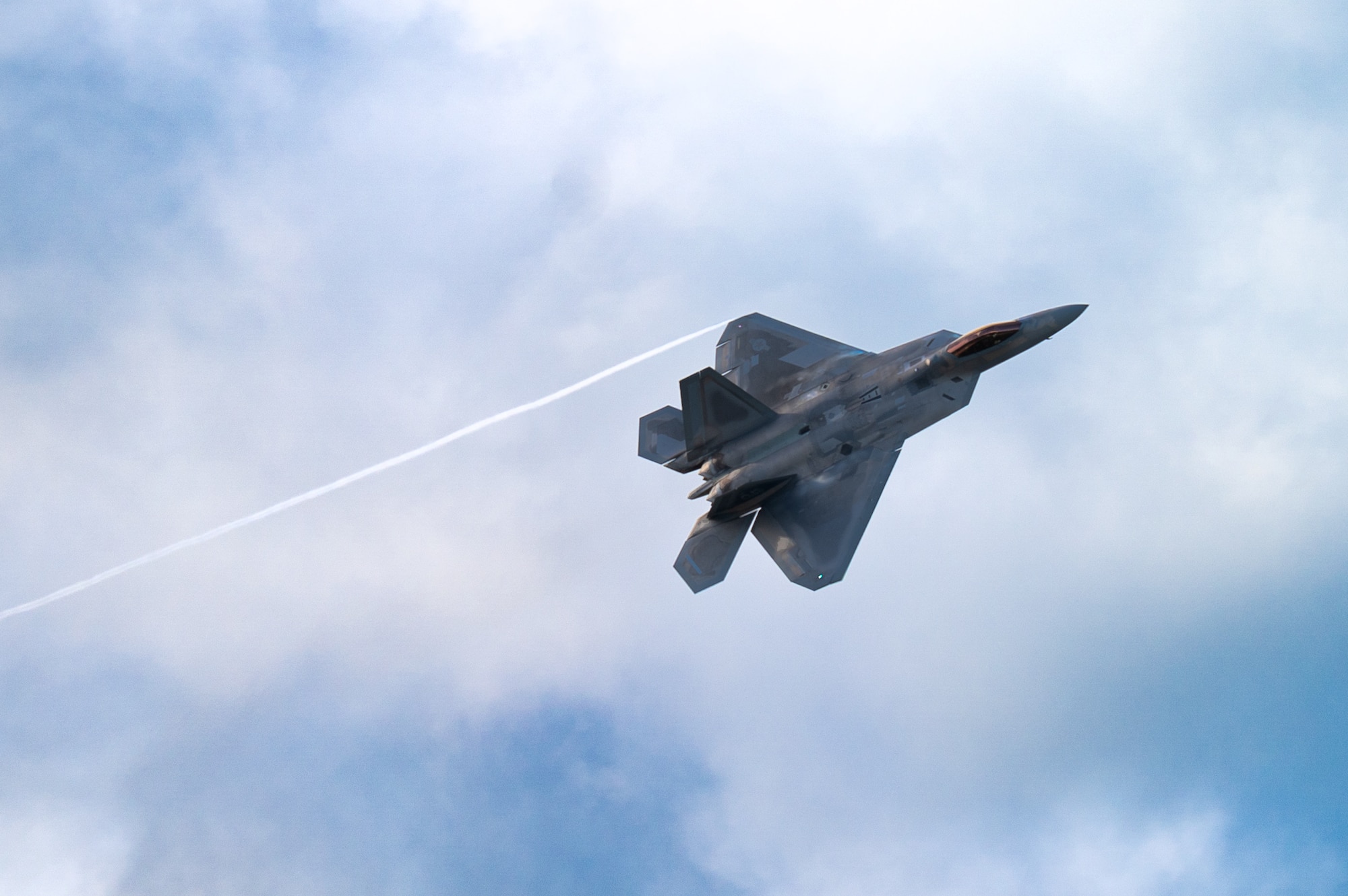 U.S. Air Force F-22 Raptors assigned to the 3rd Air Expeditionary Wing conduct aerial maneuvers during exercise Resolute Force Pacific 2025 in Tinian, Northern Mariana Islands, July 17, 2025. REFORPAC is part of a first-in-a-generation Department-Level Exercise series, employing more than 400 Joint and coalition aircraft and more than 12,000 members at more than 50 locations across 3,000 miles.