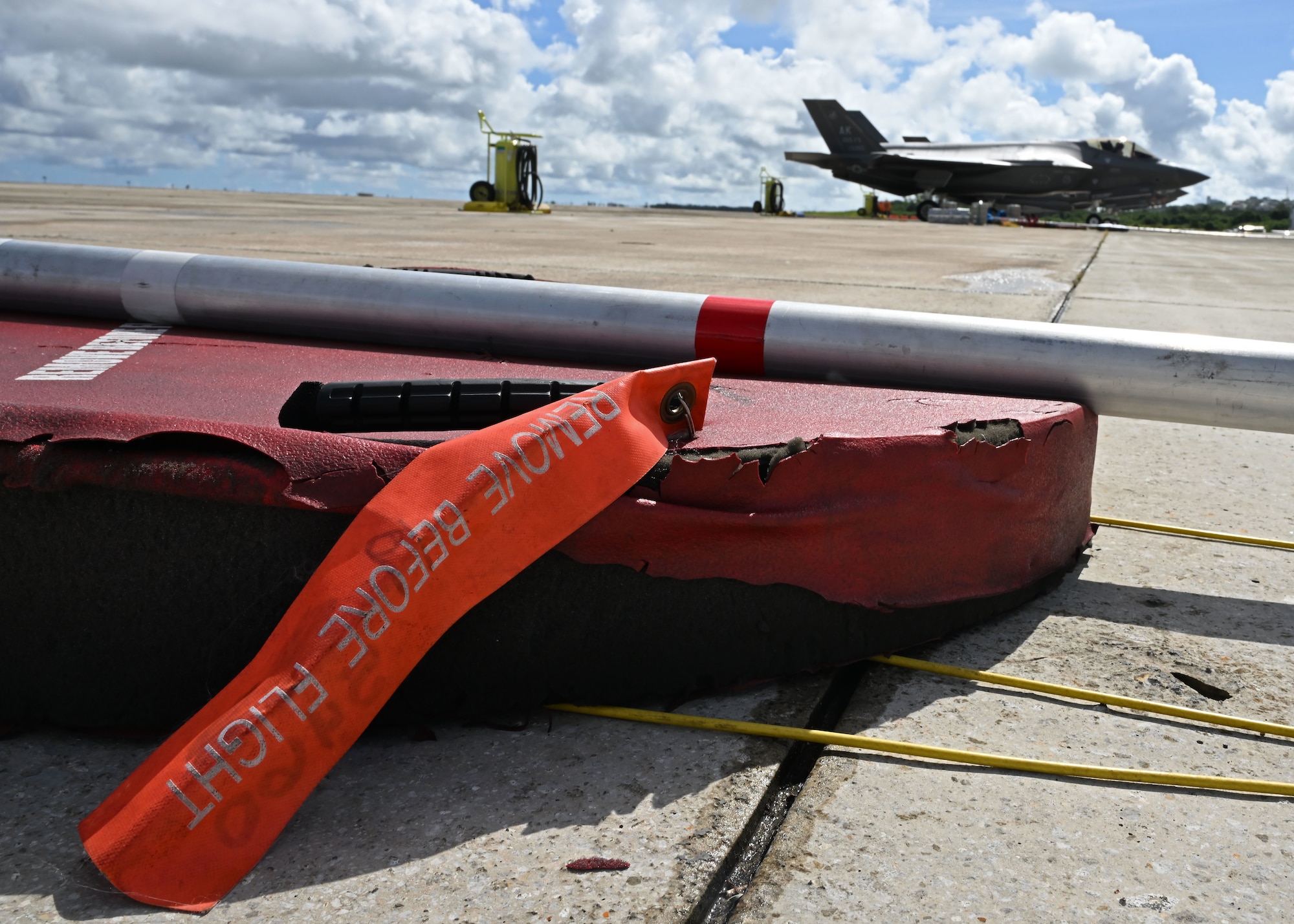 An F-35A Lightning II sits on the flight line before a flight during exercise Resolute Force Pacific (REFORPAC) 2025, July 17, 2025.