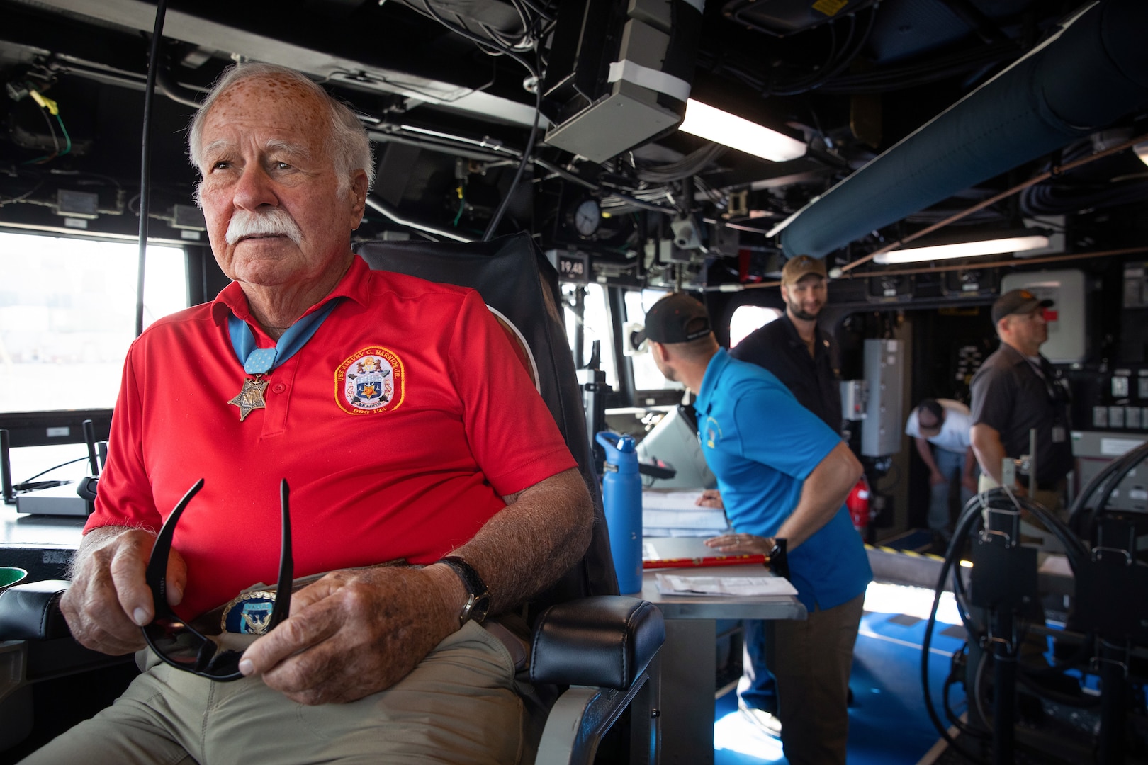 BATH, ME (July 15, 2025) – U.S. Marine Corps Col. (Ret.) Harvey C. Barnum Jr., a Medal of Honor recipient, sits on the bridge of the future USS Harvey C. Barnum Jr. (DDG 124) during sea trials. The ship is named in honor of Barnum, who received the Medal of Honor for valor during the Vietnam War. (U.S. Navy photo by Laura Lakeway)