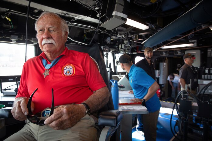 BATH, ME (July 15, 2025) – U.S. Marine Corps Col. (Ret.) Harvey C. Barnum Jr., a Medal of Honor recipient, sits on the bridge of the future USS Harvey C. Barnum Jr. (DDG 124) during sea trials. The ship is named in honor of Barnum, who received the Medal of Honor for valor during the Vietnam War. (U.S. Navy photo by Laura Lakeway)