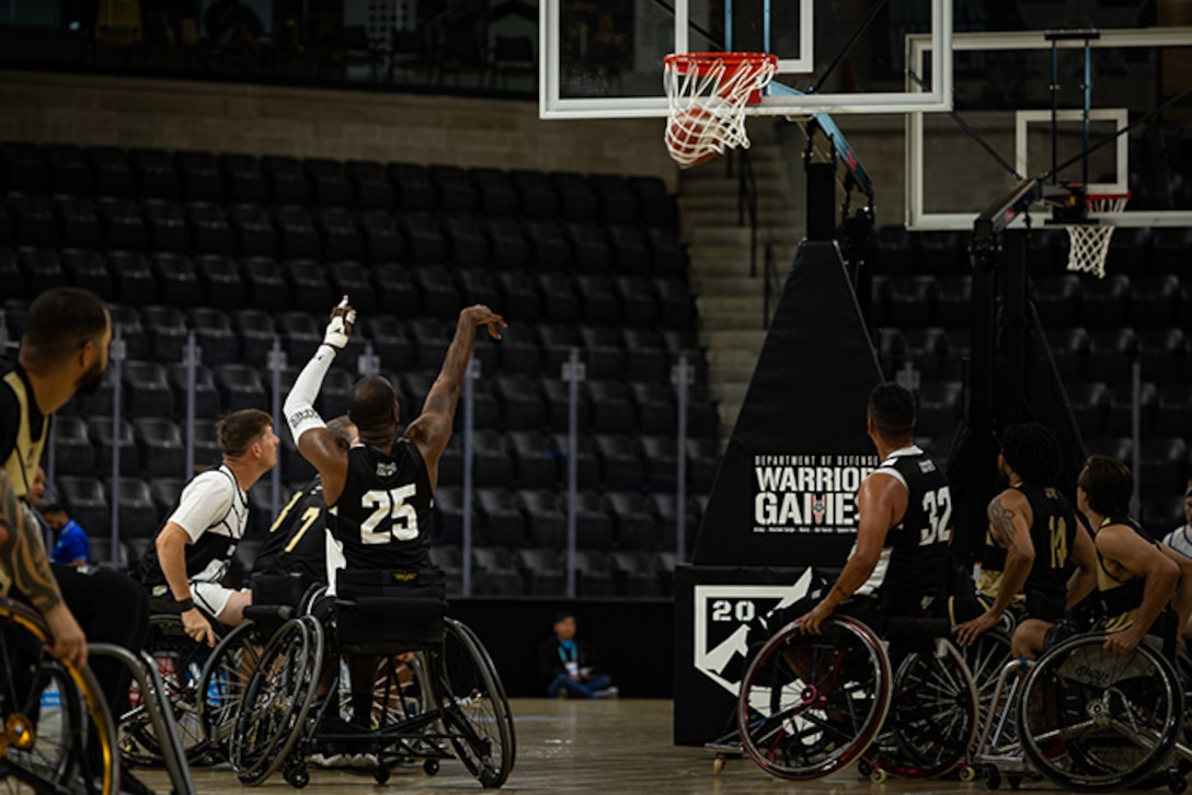 U.S. Army Staff Sgt. Derrick Thompson scores a free throw during wheelchair basketball at the 2025 Department of Defense Warrior Games at Colorado Springs Colorado, July 19, 2025.