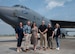 Members of the Association of Defense Communities and Minot Area Chamber Economic Development Corporation pose for a photo in front of a B-52H Stratofortress.