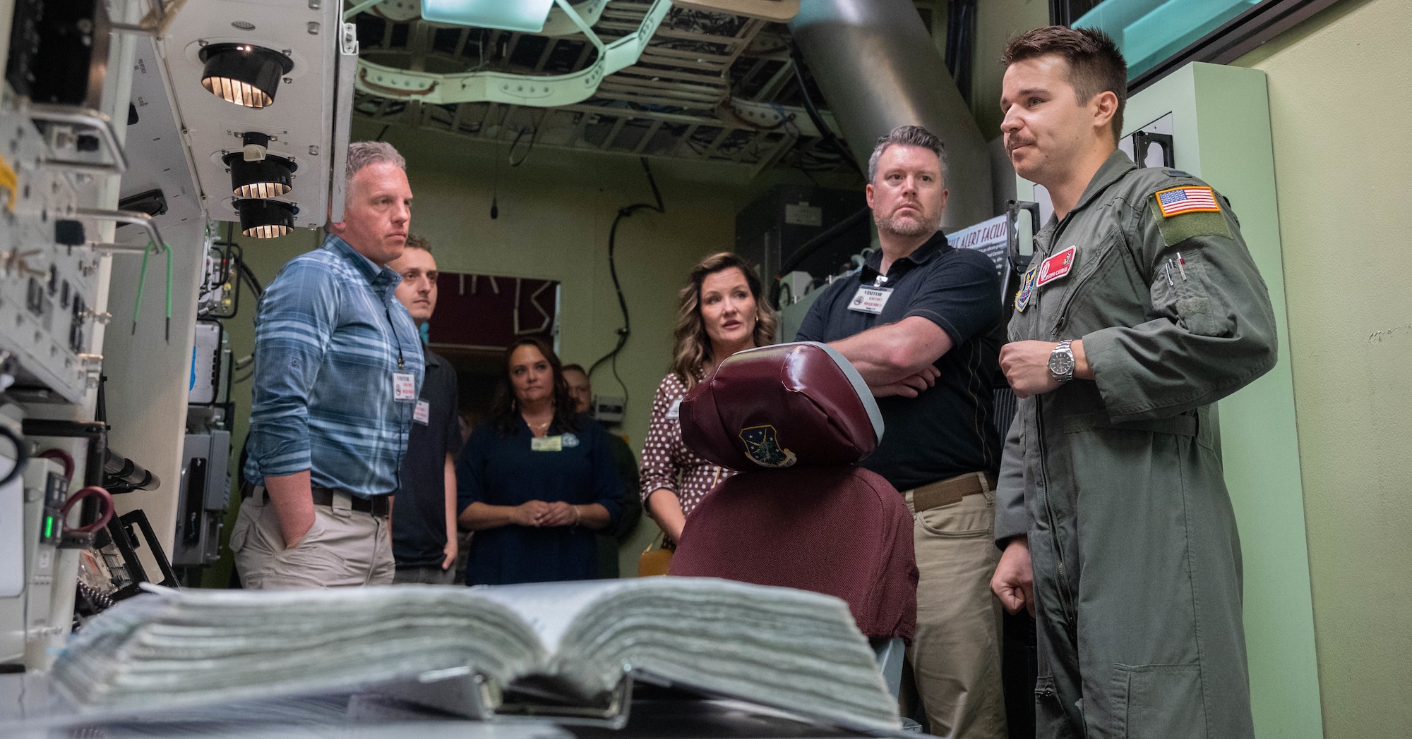 Members of the Association of Defense Communities and Minot Area Chamber Economic Development Corporation receive a tour of a missile alert training facility.