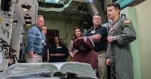 Members of the Association of Defense Communities and Minot Area Chamber Economic Development Corporation receive a tour of a missile alert training facility.