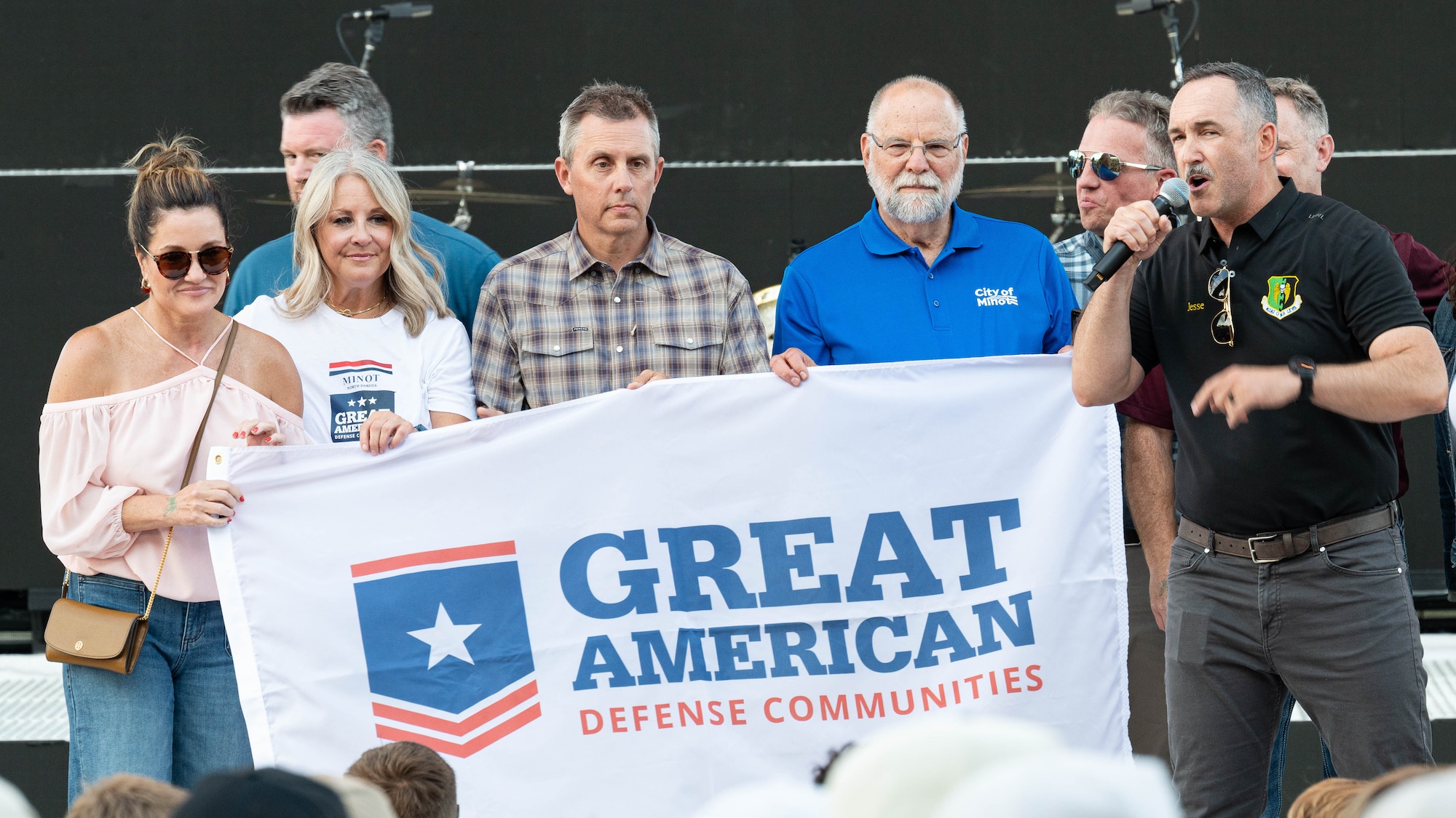 U.S. Air Force Col. Jesse Lamarand, 5th Bomb Wing commander, addresses a crowd.