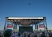 A B-52H Stratofortress performs a flyover a crowd.
