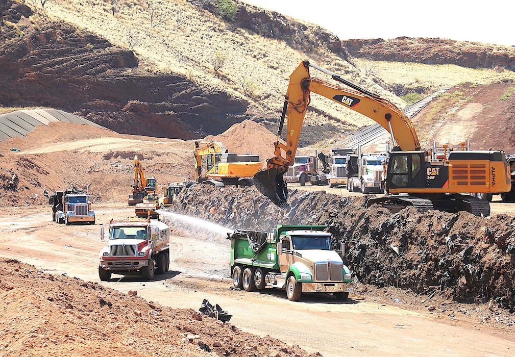 Moving the Maui wildfire debris from the temporary disposal site to the permanent site.