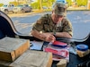 Soldier creates hand-painted mementos for fellow Hurricane Helene relief team members